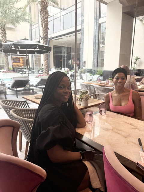 Two friends together at a resort